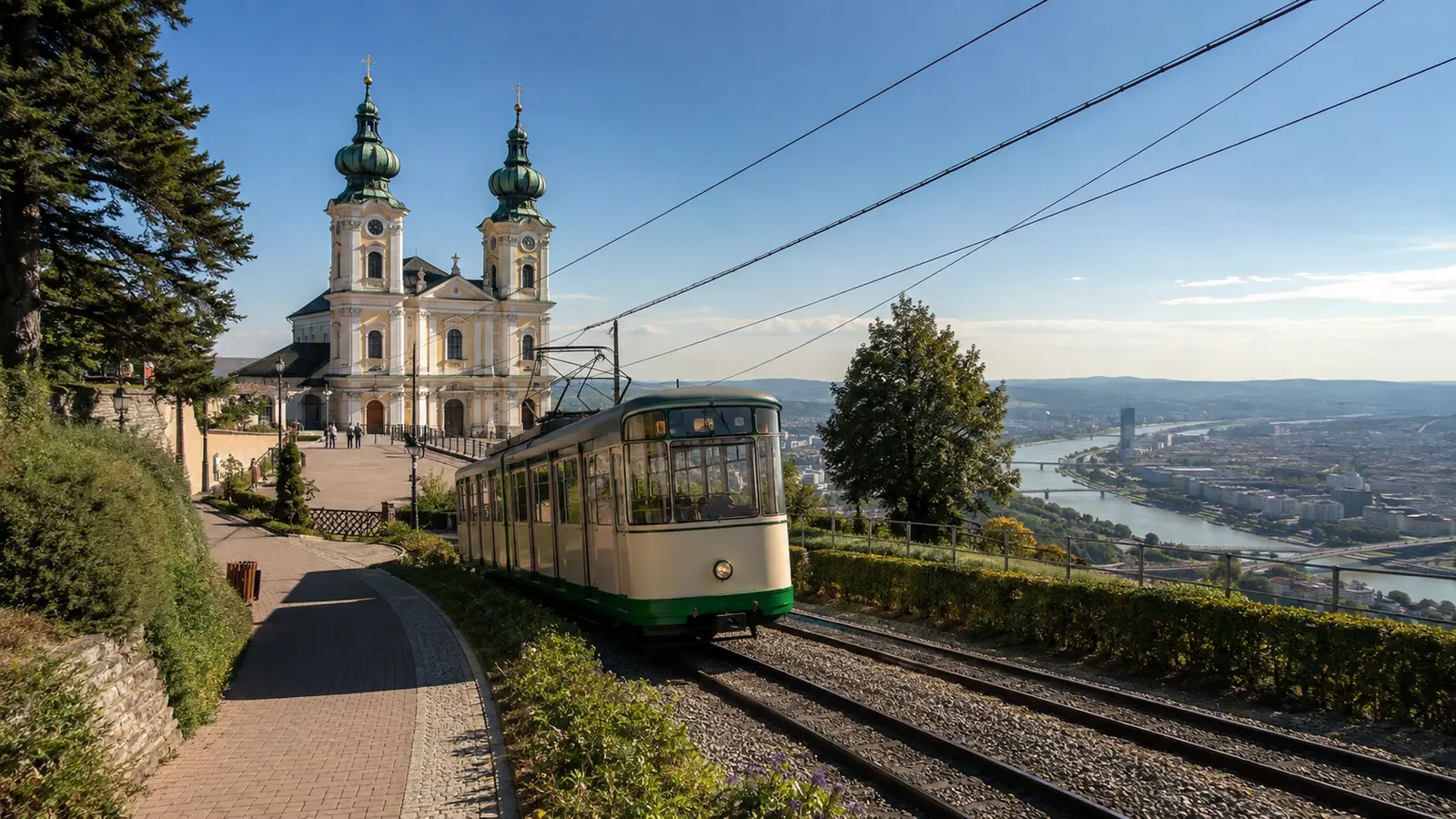 รถราง Pöstlingbergbahn และมหาวิหารยอดโดมคู่บนเนิน Pöstlingberg เมืองลินซ์