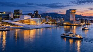 ภาพ AI จำลองทิวทัศน์ Bjørvika โรงอุปรากร และริมน้ำออสโลยามค่ำ